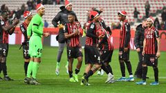 Nice celebrate their win with the offending festive hats