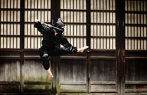 Asian woman showing her ninja moves