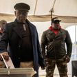 Lesotho Prime Minister Thomas Thabane (C) was summoned by police for questioning over alleged links to the 2017 murder of his estranged wife