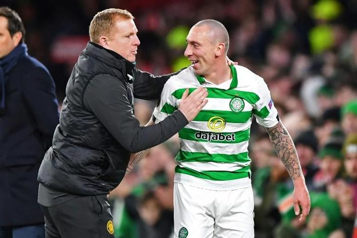 Captain fantastic: Scott Brown (right) saved Celtic with a late winner against Hamilton