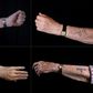 Holocaust survivors show Auschwitz prison numbers on their arms