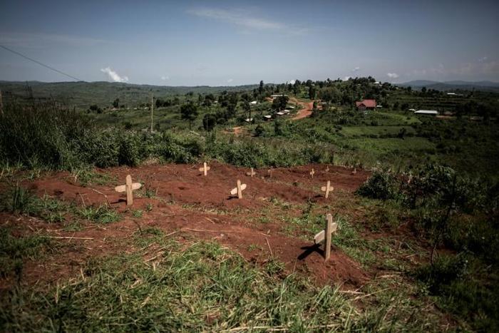 Graves of fallen DR Congo soldiers are pictured in July 2019 outside a base in Djugu, eastern DR Congo