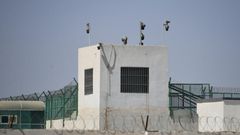 This May 2019 photo shows the outer wall of a complex in Hotan, in China's Xinjiang region, which includes what is believed to be a re-education camp where Muslim ethnic minorities are detained