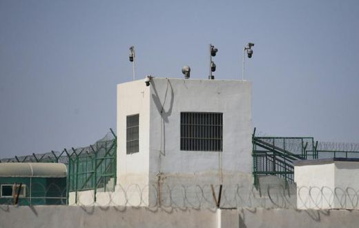 This May 2019 photo shows the outer wall of a complex in Hotan, in China's Xinjiang region, which includes what is believed to be a re-education camp where Muslim ethnic minorities are detained
