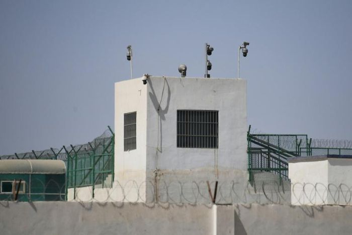This May 2019 photo shows the outer wall of a complex in Hotan, in China's Xinjiang region, which includes what is believed to be a re-education camp where Muslim ethnic minorities are detained
