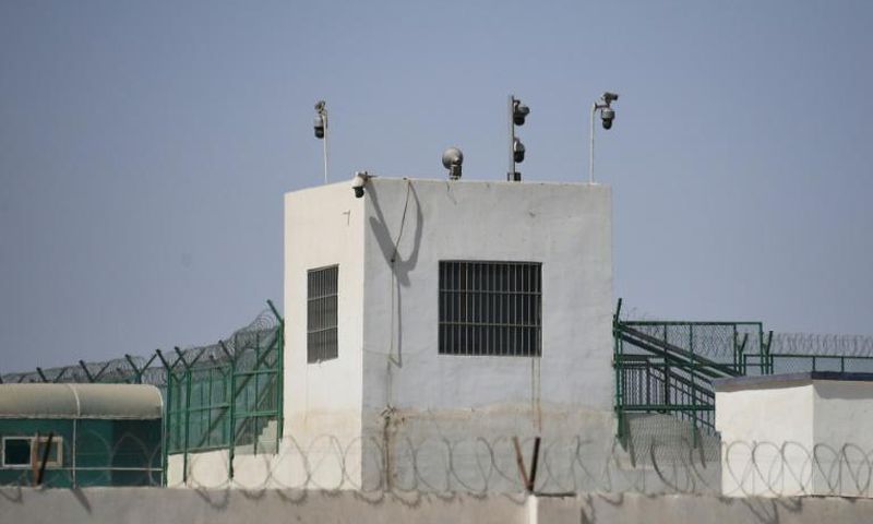 This May 2019 photo shows the outer wall of a complex in Hotan, in China's Xinjiang region, which includes what is believed to be a re-education camp where Muslim ethnic minorities are detained