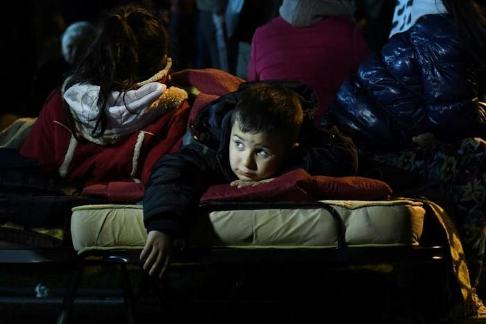 Thousands of people spent the night in tents or on the grass of the football stadium in Durres, where some 27 buildings were badly damaged