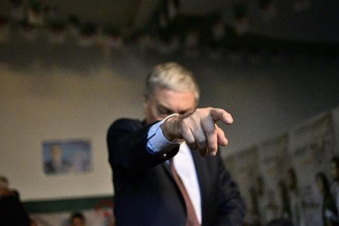 Algerian presidential candidate Ali Benflis gesturing at another campaign event on November 19, 2019