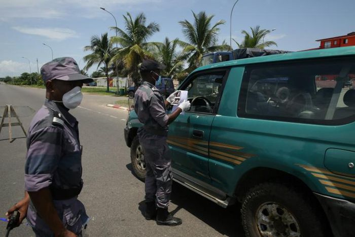 Police set up road blocks to check people had the proper authorization to be out