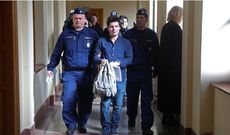 Rui Pinto (centre) is escorted by guards as he is extradited from Hungary to PortugalCredit: AP