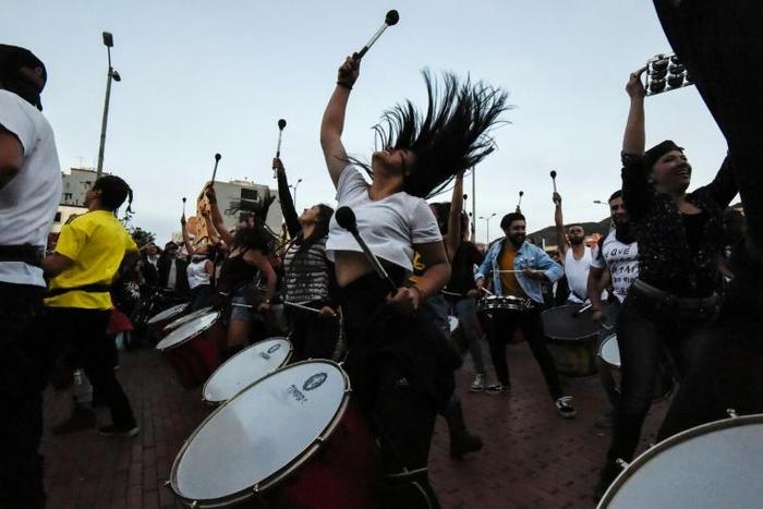 Hundreds of people, some playing musical instruments and others banging pots and pans, demonstrated on Thursday in the north of the capital Bogota