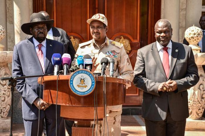 South Sudanese President Salva Kiir, left, pictured on Monday with opposition leader Riek Machar, right, and Mohamed Hamdan Daglo, deputy head of the Transitional Military Council in Sudan