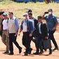 Brazilian President Jair Bolsonaro (3-L), who has scorned social distancing measures to combat COVID-19, is pictured here without a mask as he visits the site of a field hospital under construction in Aguas Lindas, Goias State to handle virus cases