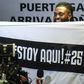 Togo forward Emmanuel Adebayor holds up a message to his new fans at Paraguay champions Olimpia on his arrival in Asuncion