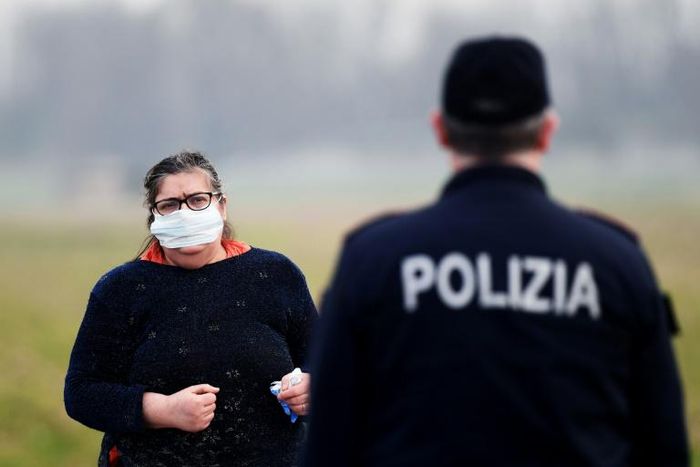 Police setting up checkpoints said they would enforce a blockade which Italy's prime minister warned could last for weeks