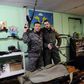 Members of the Russian Imperial Movement who are volunteers of the self-declared Donetsk People's Republic pose with weapon simulators at a training base in Saint Petersburg in 2015