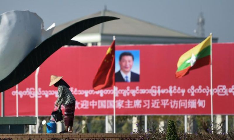 Billboards and banners welcomed China's Xi Jinping to Naypyidaw on Friday