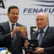 Rafael Callejas, shown here in 2011 with former FIFA president Sepp Blatter, pleaded guilty in FIFAgate