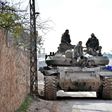 Syrian troops advance through Idlib province towards Saraqeb, a strategic crossroads town long in the sights of government commanders