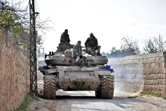 Syrian troops advance through Idlib province towards Saraqeb, a strategic crossroads town long in the sights of government commanders