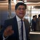 Ecuador's Foreign Minister Jose Valencia gestures after a press conference in which he announced that four opposition deputies had been granted political asylum by Mexico