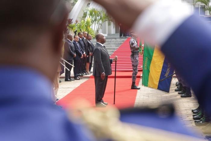 President Ali Bongo, pictured here at a wreath-laying ceremony in August, has been in power for 10 years, succeeding his father Omar. Speculation about his health has swirled since he suffered a stroke in October 2018