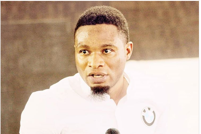 Pastor arrested for vomiting millions of different currencies (video)