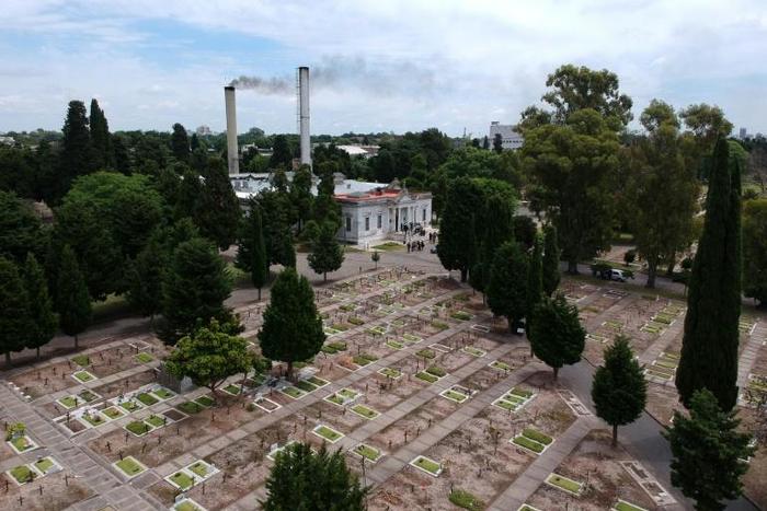 Smoke rises from a crematorium chimney at Chacarita Cemetery in Buenos Aires, Argentina, where cremation grows increasingly popular due to the high costs of traditional funerals