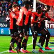 Rennes’ French midfielder Faitout Maouassa  (2R) celebrates with teammates after scoring  a goal during the French L1 football match between Stade Rennais Football Club and Montpellier Herault SC at the Roazhon Park, in Rennes, northwestern France, on ...