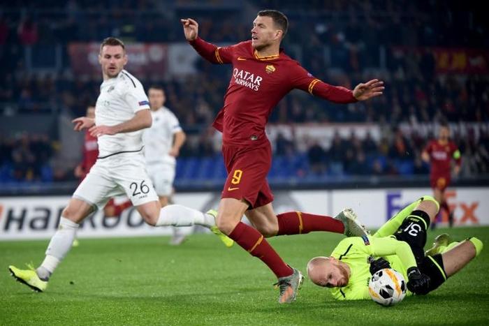 Forward Edin Dzeko in action for Roma - reports say US billionaire Dan Friedkin is set to take over the Serie A club
