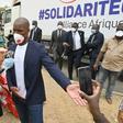 Didier Drogba speaks to media as he helps distribution of food and sanitary  products in Abidjan