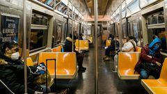 They Can't Afford to Quarantine. So They Brave the Subway.