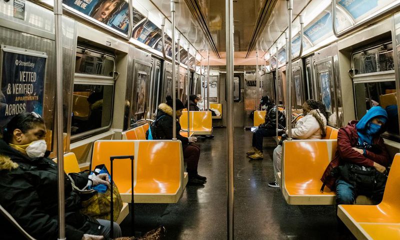 They Can't Afford to Quarantine. So They Brave the Subway.