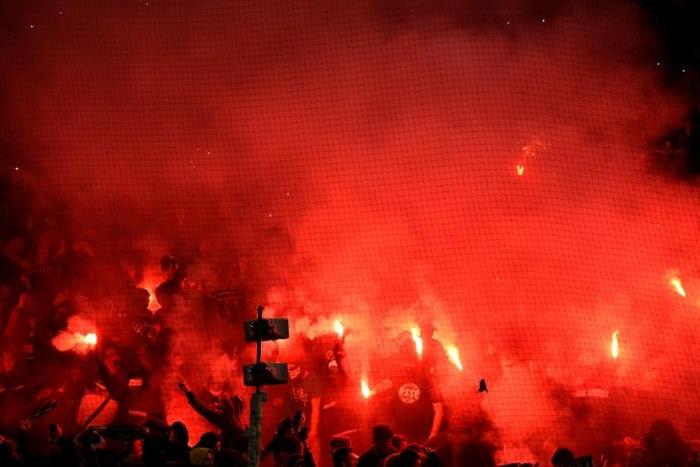 Saint-Etienne's supporters set off flares and let of fireworks during their defeat to Paris Saint-Germain