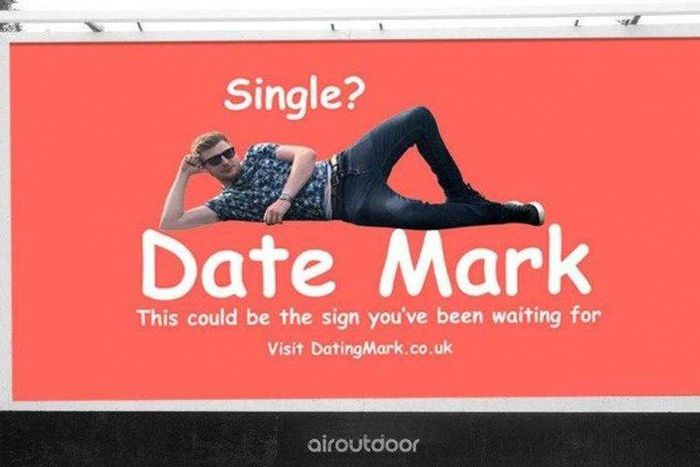 Tired single man resorts to billboard advertisement to find a suitor