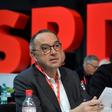 The newly elected co-leaders of Germany's SPD party have been given a mandated to seek more concessions from their CDU coalition partners