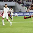 Vissel Kobe midfielder Keijiro Ogawa fires home as Johor Darul Ta'zim defender Aidil Zafuan looks on during their AFC Champions League group G football match at Misaki Park Stadium in Kobe