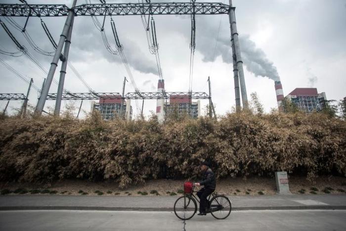 Global coal-fired electricity from plants like this one in Shanghai, China, could see a record fall this year