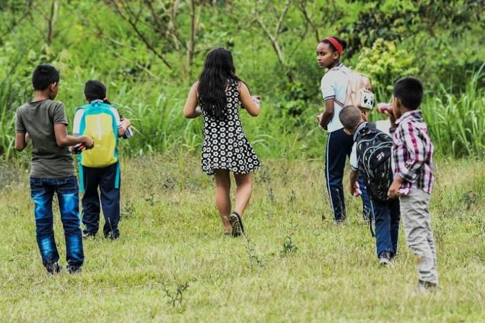 Children of former FARC combatants play in Columbia's La Montanita municipality