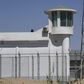 A watchtower on a high-security facility near what is believed to be a re-education camp on the outskirts of Hotan, in China's northwestern Xinjiang region, is seen in May 2019