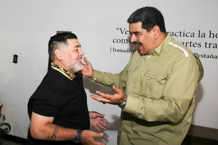 Venezuela's President Nicolas Maduro (R) has thanked Argentina's former football player Diego Armando Maradona for his support