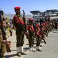 Members of the Huthi rebels military police parade in the streets of the capital Sanaa on January 8, 2020