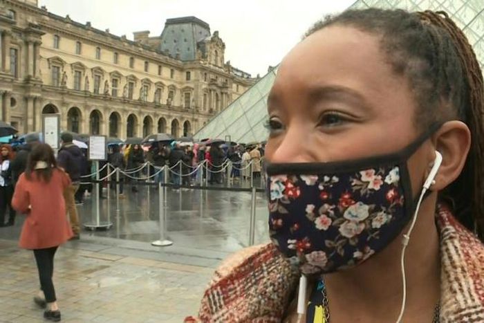 Tourists react as Paris's Louvre museum remains shut over coronavirus fears