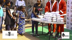 Ghanaian model, Leopold Kwao feeds kids at James Town Community