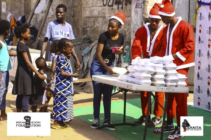 Ghanaian model, Leopold Kwao feeds kids at James Town Community