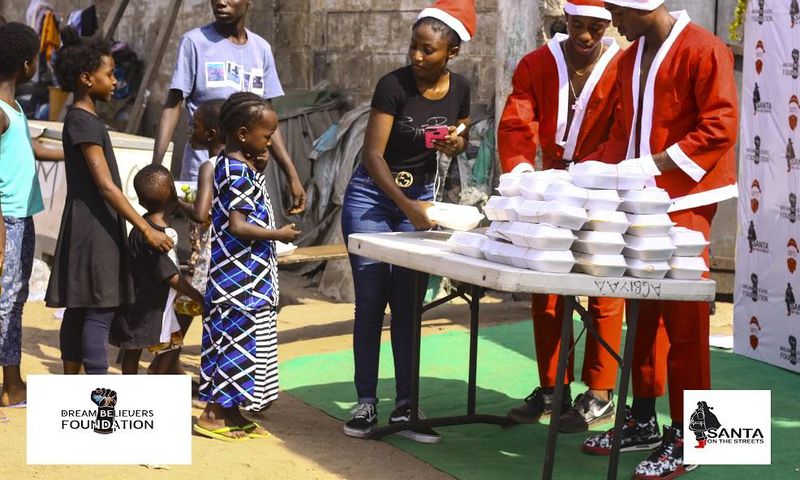 Ghanaian model, Leopold Kwao feeds kids at James Town Community