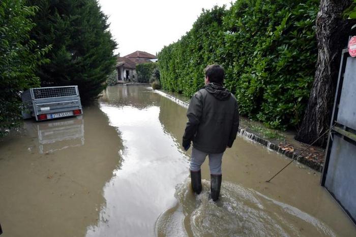Gale-force winds and heavy rains left thousands of homes without electricity