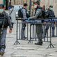 Israeli security forces, wearing protective masks as a precaution during the COVID-19 coronavirus pandemic, stand guard in Jerusalem's old city