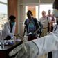 Passengers from an international flight being screened at Juba International Airport in South Sudan
