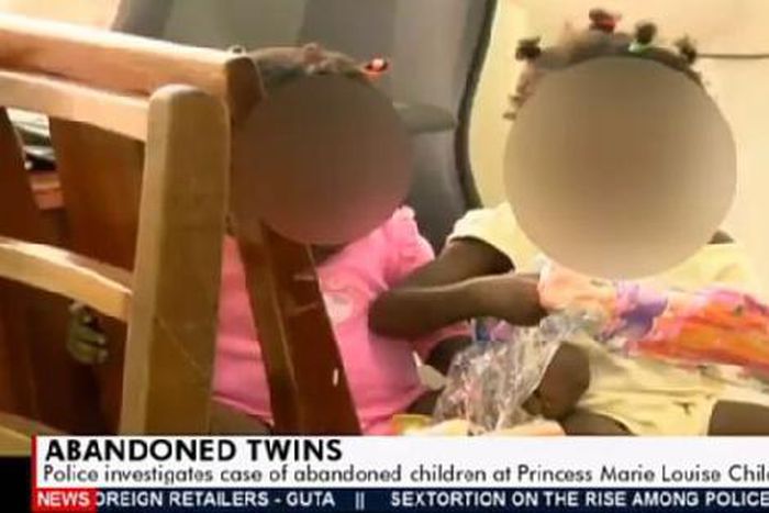 The twins were left in the care of another woman by their mum to use the washroom